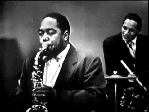 Black-and-white portrait of a saxophonist