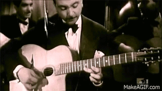 Guitarist playing acoustic guitar