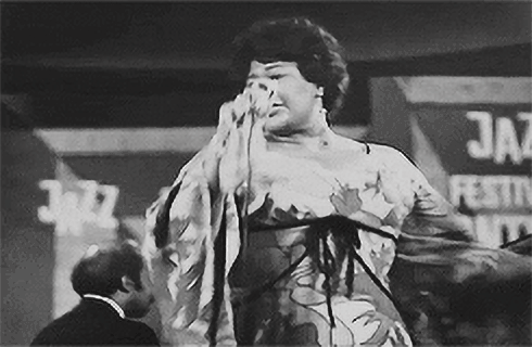 Jazz singer performing at a festival