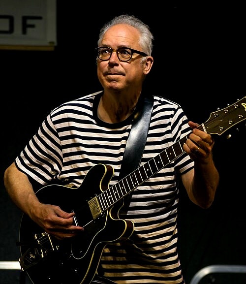 Guitarist performing on stage