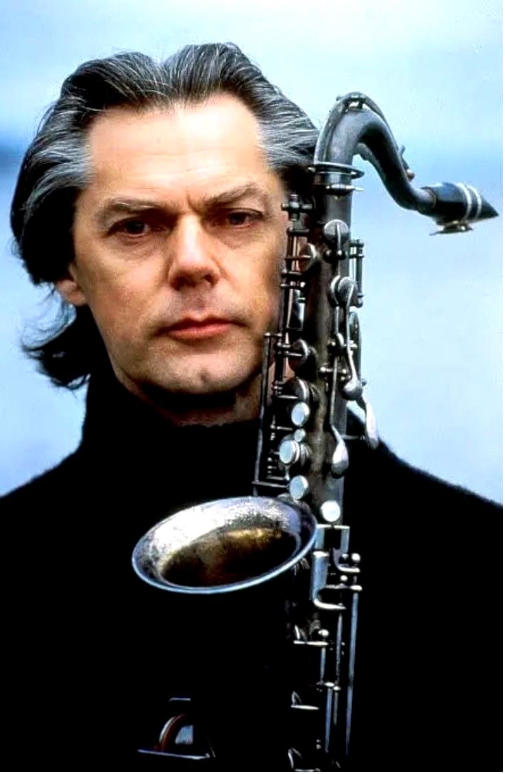 Saxophone player performing with a band