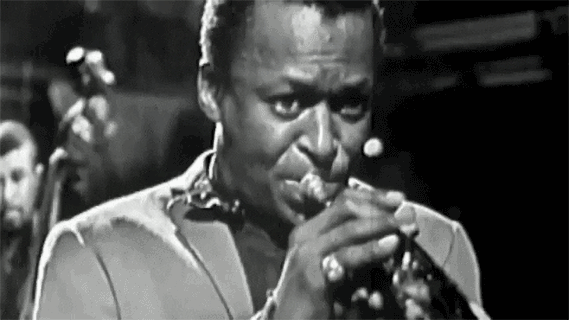Black-and-white portrait of a trumpet player