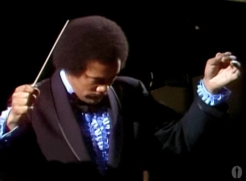 Trumpet player under concert lights